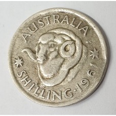 AUSTRALIA 1961 . ONE 1 SHILLING . ERROR . CLIPPED PLANCHET . BITTEN EDGE